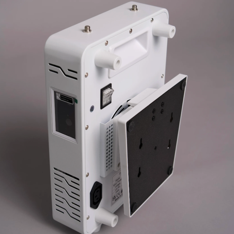 White electronic device with a hinged panel open to reveal a black mounting surface, photographed on a neutral gray studio background. Red Light Panel
