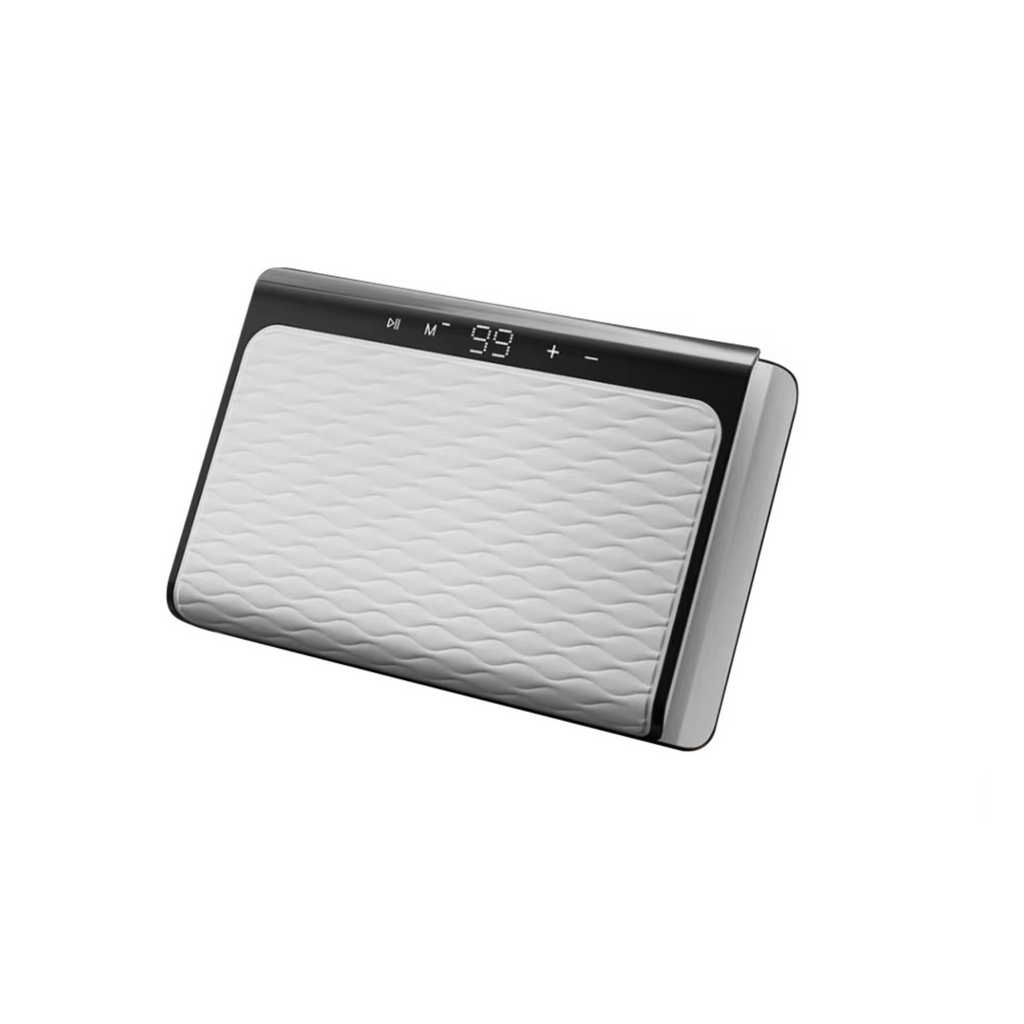 A rectangular heated blanket with a textured white quilted surface, a black top control panel with a digital temperature display, and a metallic silver side frame, shown on a plain white background.